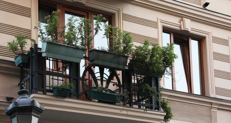 Ownership and maintenance responsibilities for the under-balcony concrete platform: who is accountable and in charge of its upkeep?