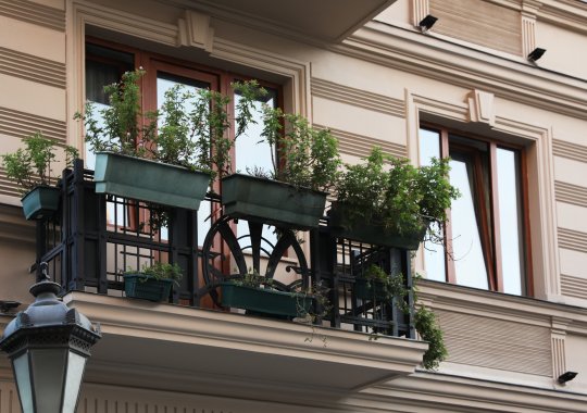 Ownership and maintenance responsibilities for the under-balcony concrete platform: who is accountable and in charge of its upkeep?