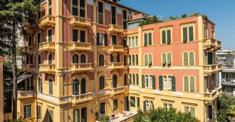 A two-bedroom apartment is for sale in the center of Sanremo near the sea.